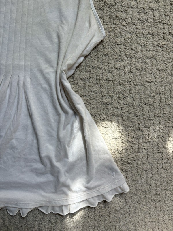 Y2K American Eagle white Fairycore babydoll top with ruffle hem and bow Sz L gallery
