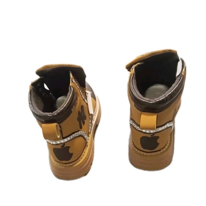 Mainalun brand boots that have been custom decorated with a New York Yankees... gallery