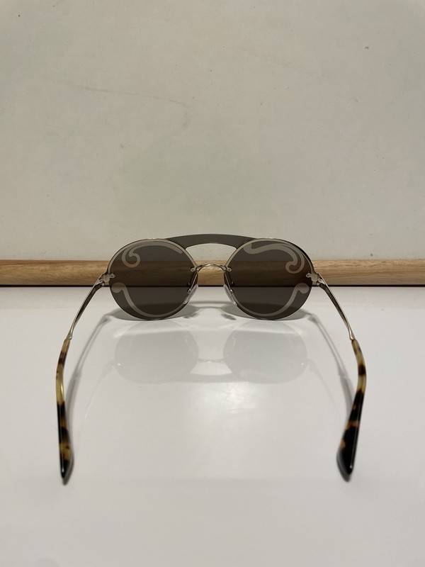 Authentic PRADA Sunglasses- 65TS Pale Gold Frame Silver Mirror Lens gallery