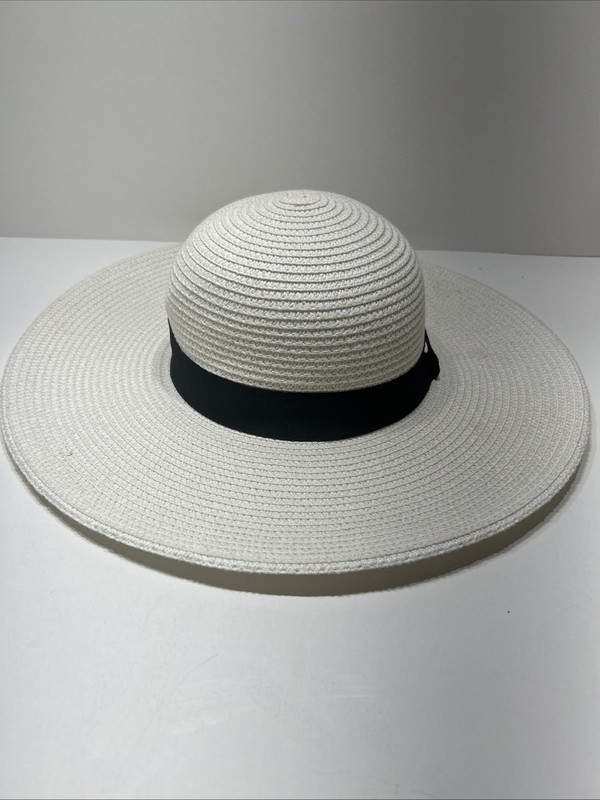 Woman’s Floppy Magid Straw Hat With Black Ribbon