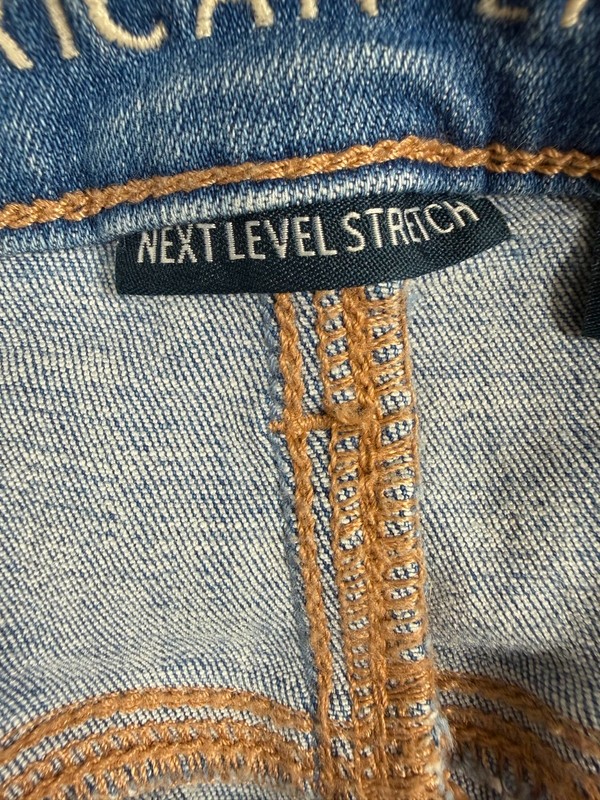 American Eagle Hi-Rise Shortie Light Wash Distressed Denim Shorts Lace Detail gallery