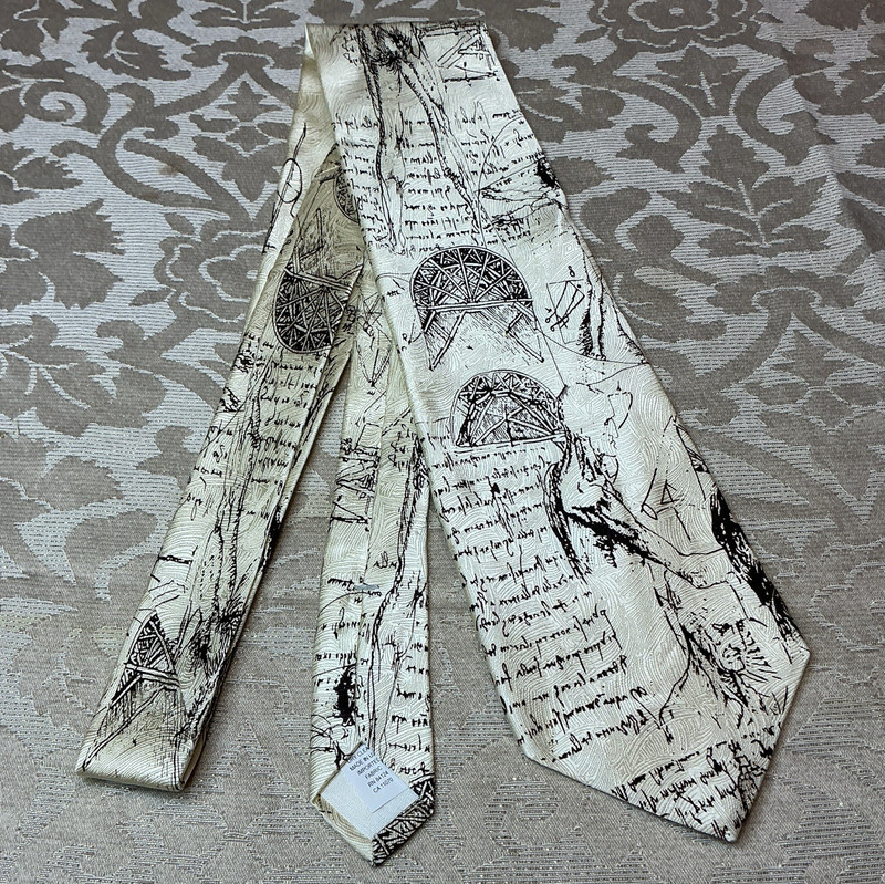 RM Style Men’s Woven Silk Graphic Print Tie Ivory/Black Da Vinci Logo 1-Piece