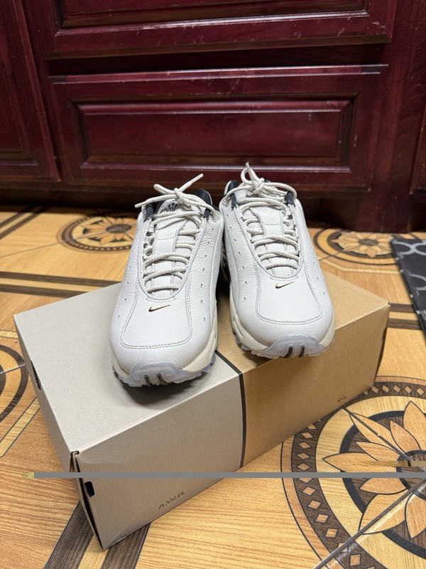Nike NOCTA Hot Step Air Terra Champagne Light Bone/Metallic Gold DH4692-003 gallery