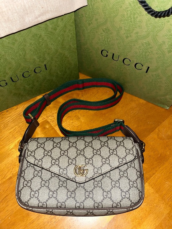 Authentic Gucci Ophidia Pochette in Beige & Ebony Supreme GG Canvas variation gallery