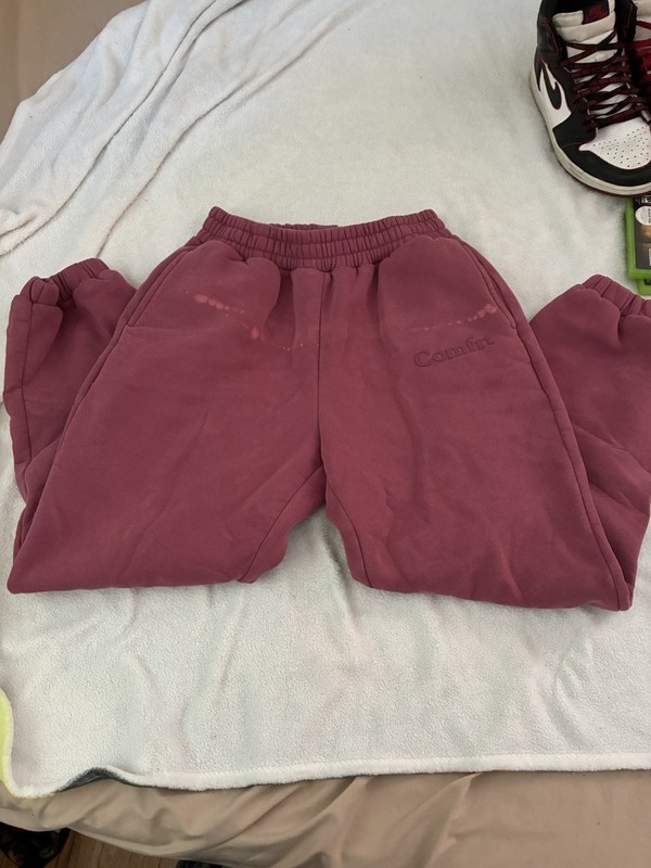 Comfrt Minimalist Sweatpants, Berry Color, Size M. Small bleach stain as shown.