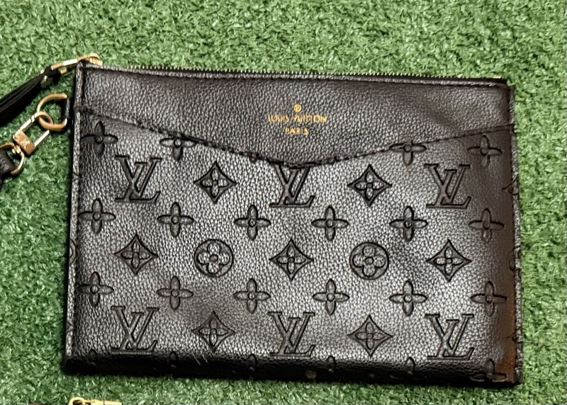 Louis Vuitton Daily Pouch in Monogram Empreinte Leather (Black/Noir).